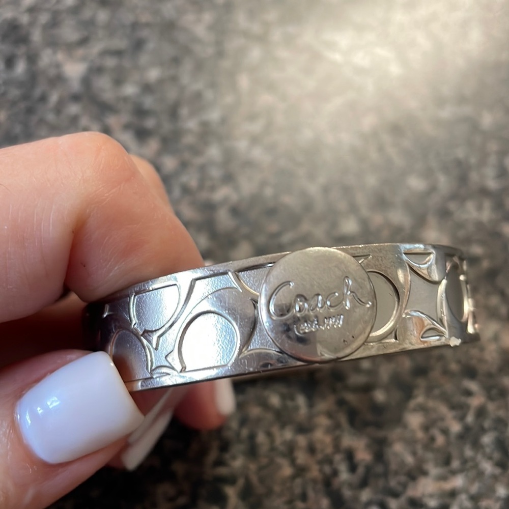 Beautiful Coach silver signature bracelet. Great to stack with other bracelets.